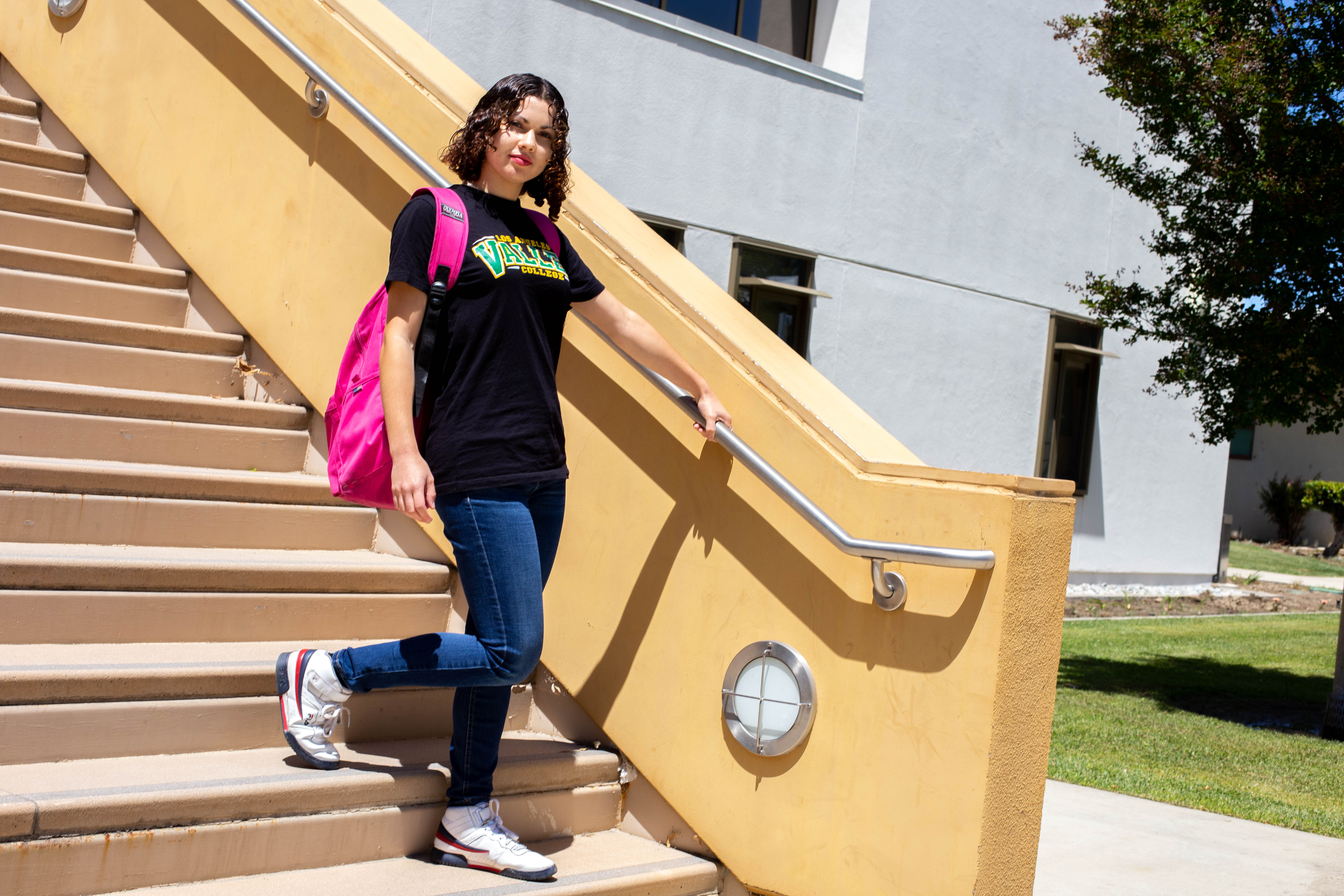 Student Girl in Stairs Walking Down