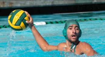 Men's Water Polo player holding a ball