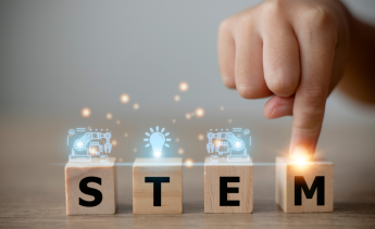 Block letters spelling out STEM with symbols representing Science, Technology, Engineering and Math and a finder pointing to the M block