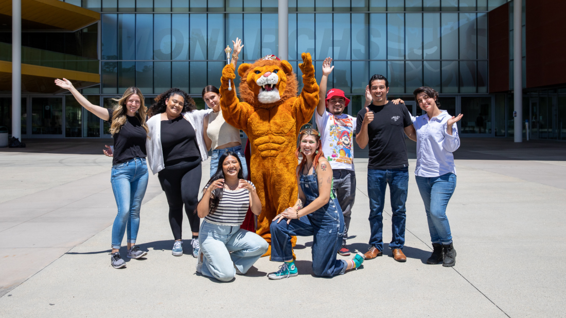 Students and staff with the LAVC Mascot in front of the Student Union