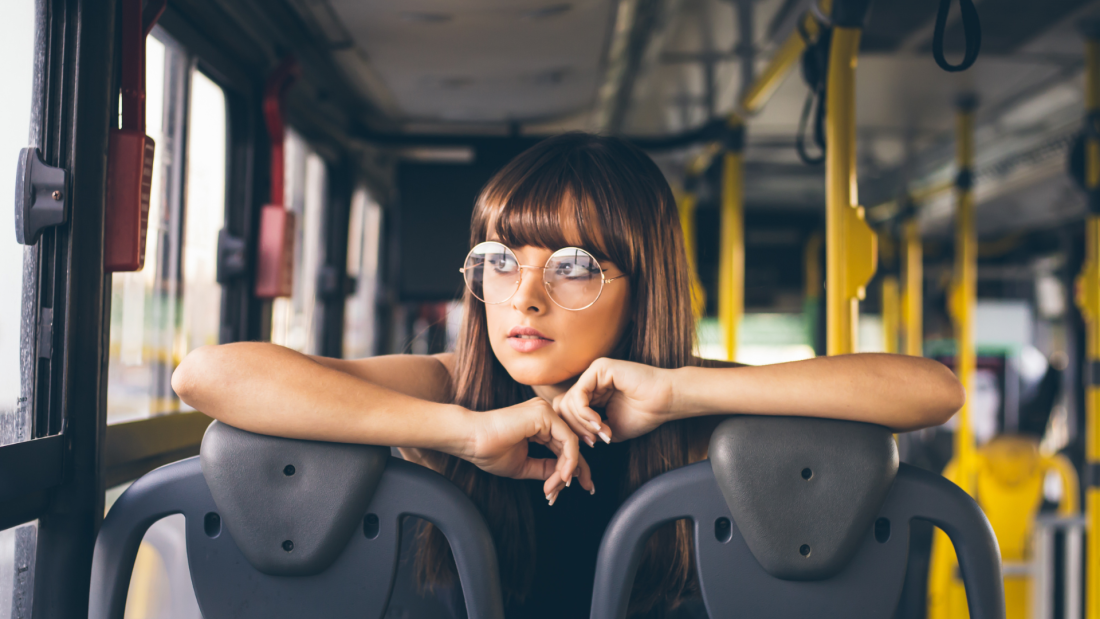 Girl riding a bus